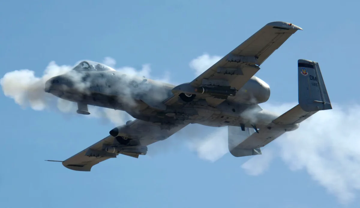 A 10 warthog firing its gun A 10 warthog firing its gun