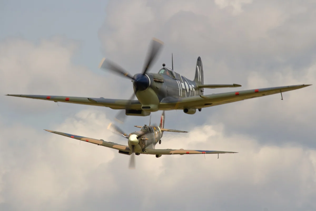 Supermarine Spitfire Mk Vb BM597 JH C G MKVB closes in on Asian Supermarine Spitfire Mk LF III PP972 G BUAR Supermarine Spitfire Mk Vb BM597 JH C G MKVB closes in on Asian Supermarine Spitfire Mk LF III PP972 G BUAR