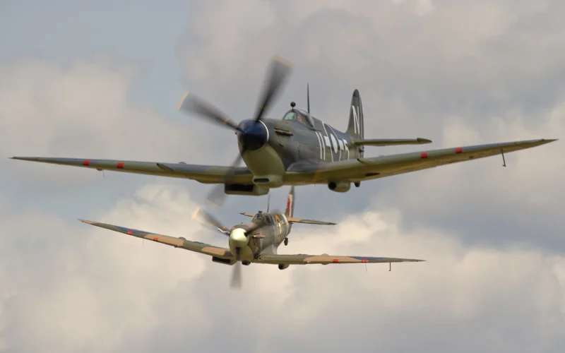 Supermarine Spitfire Mk Vb BM597 JH C G MKVB closes in on Asian Supermarine Spitfire Mk LF III PP972 G BUAR