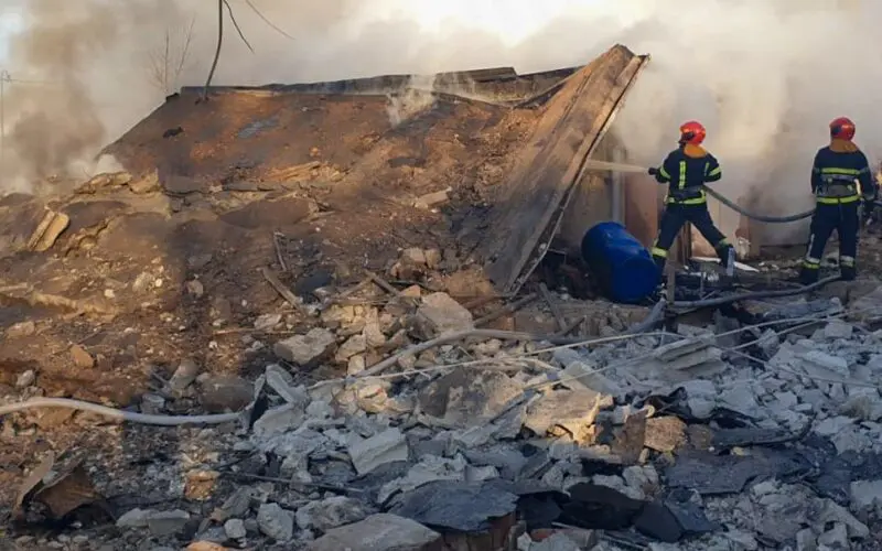 Ukrainian firefighters extinguishing a fire