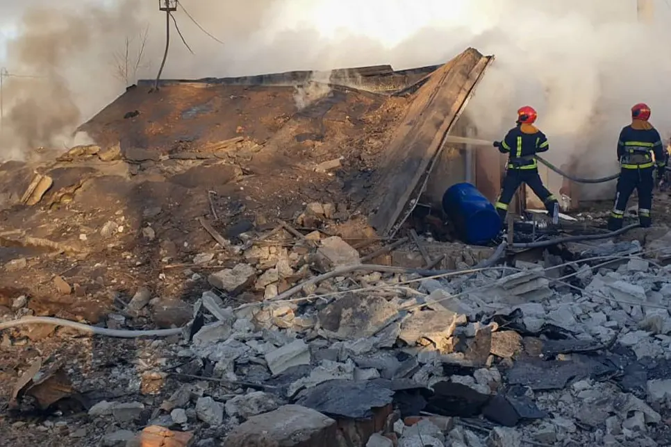 Ukrainian firefighters extinguishing a fire Ukrainian firefighters extinguishing a fire
