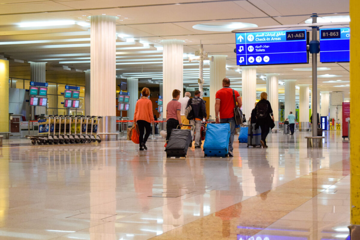 Passengers at Dubai International Airport Passengers at Dubai International Airport