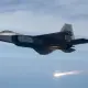 A U.S. Air Force F-22 Raptor dropping a flare