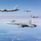 Four Finnish FA-18 Hornet multi-role fighters and a USAF KC-135 Stratotanker