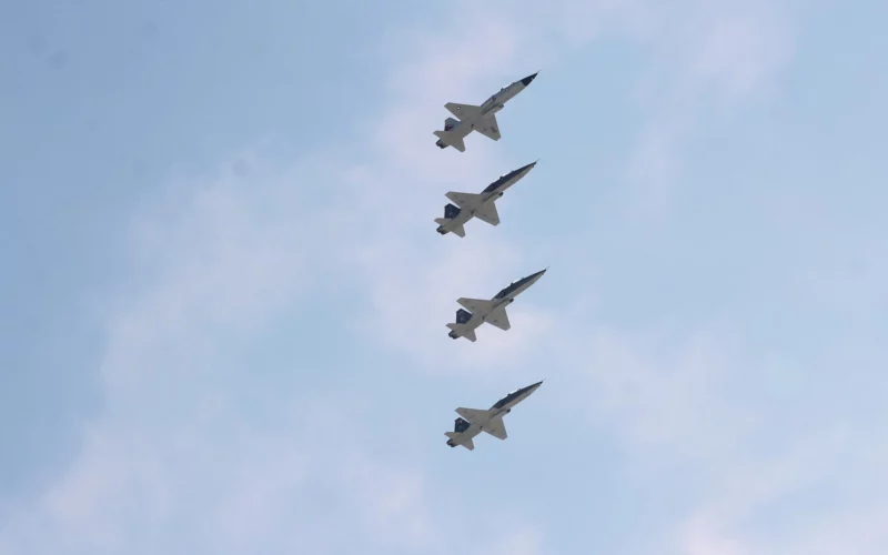 Four Northrop T-38 Talon trainer jets flying in formation