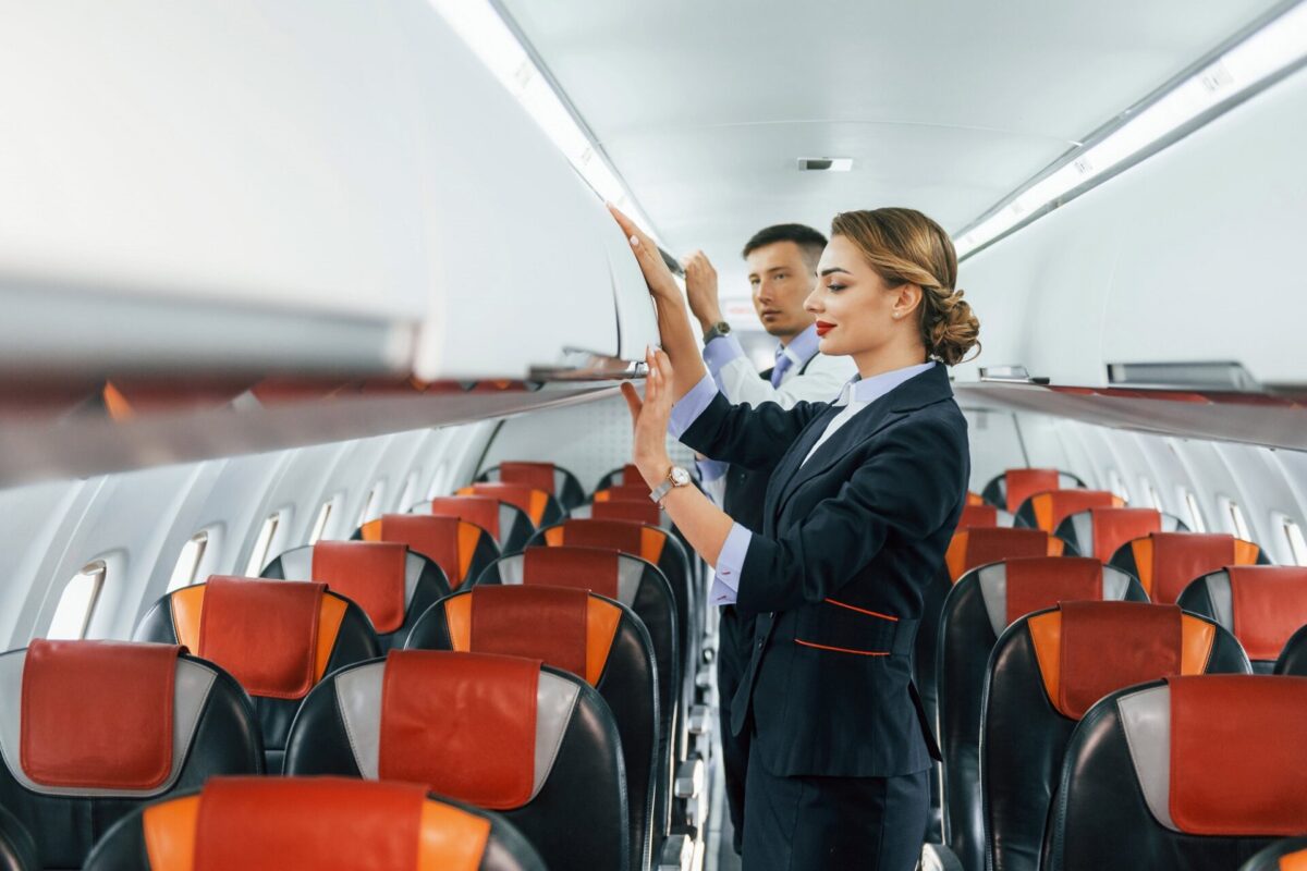 Two flight attendants in a cabin
