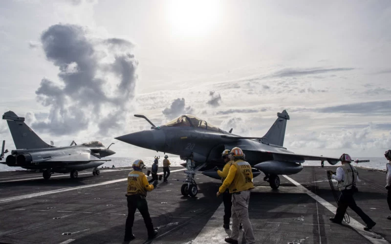 Two Rafale fighter jets on the deck of an aircraft carrier