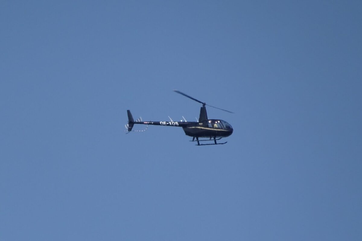 OE-XOS Robinson R44 over Tallinn Bay