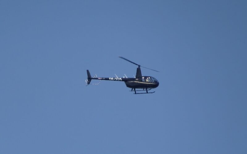OE-XOS Robinson R44 over Tallinn Bay