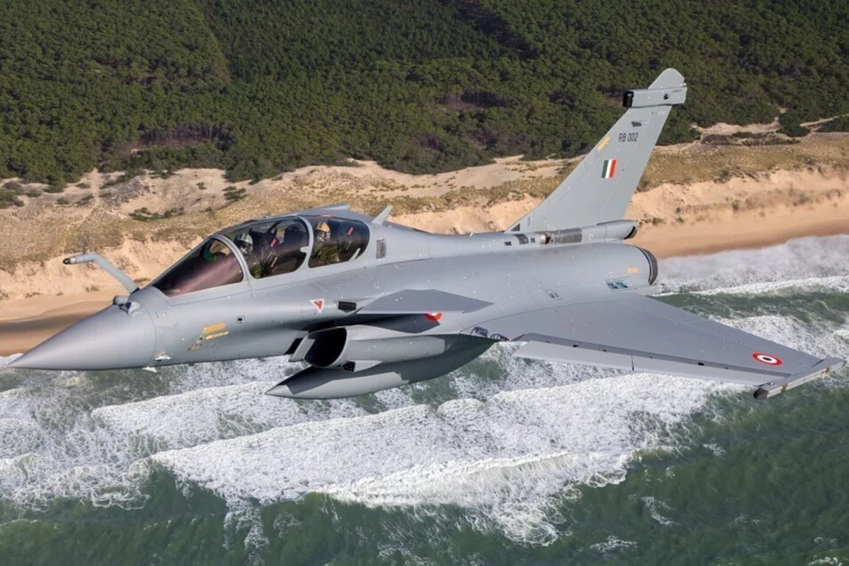 indian iaf rafale fighter jet flying above the beach indian_iaf_rafale_fighter_jet_flying_above_the_beach