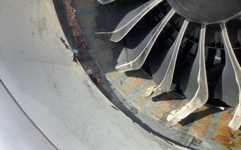 Close up photo of damage to the left Southwest Airlines engine