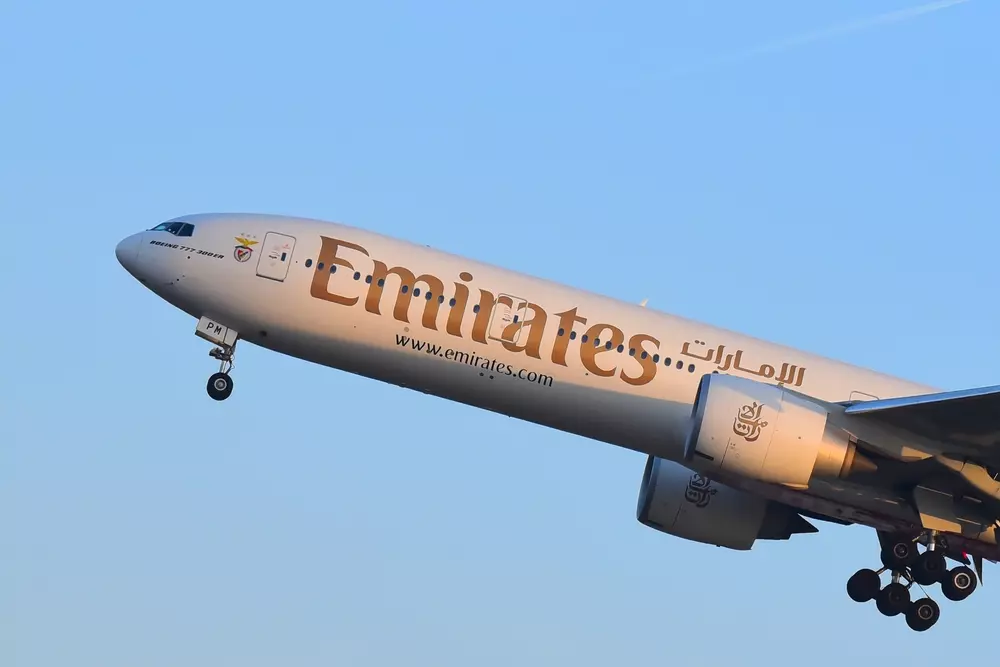 EmiratesAirlinesBoeing777 300erOverAirportOnMarch162017In Emirates