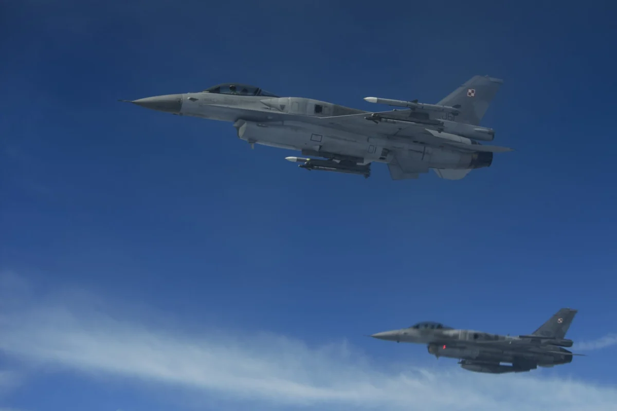 Two Polish air force F 16 Fighting Falcon fighter jets Two Polish air force F 16 Fighting Falcon fighter jets