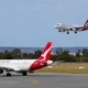 qantaslink to replace fokker with embraer