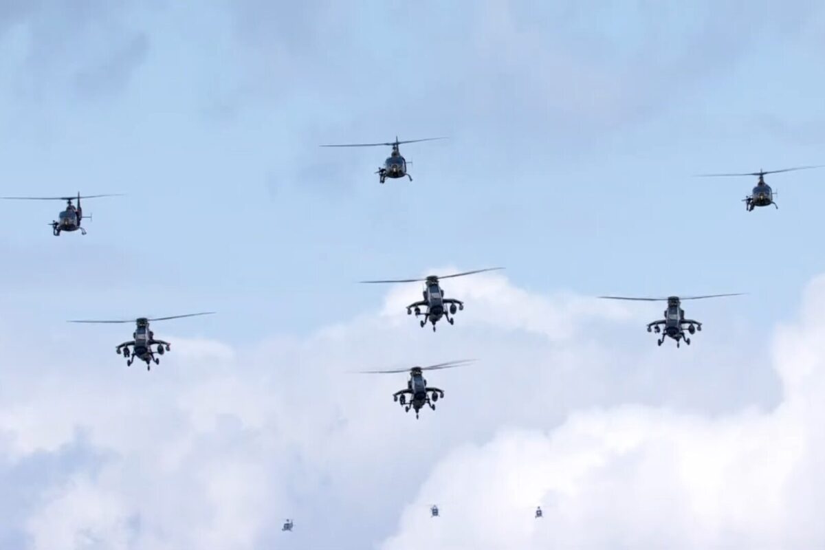 Helicopter flight group during Bastille Day flypast 2025