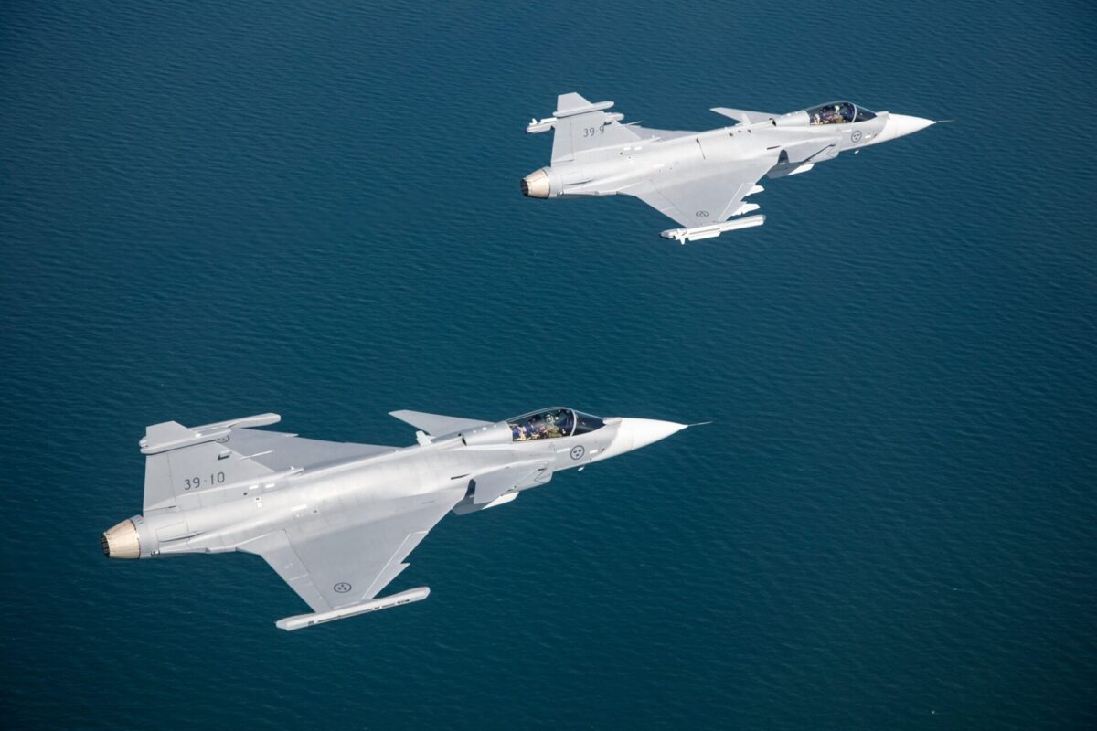 Two Saab Gripen E fighter jets flying in formation