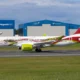 airBaltic Airbus A220 300 wearing special Baltic Heritage livery