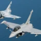 A Dassault Rafale and a Mirage 2000 flying side by side