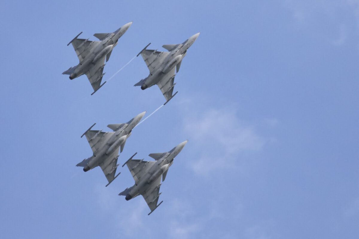 Four Swedish SAAB Jas 39 Gripens flying in formation Four Swedish SAAB Jas 39 Gripens flying in formation