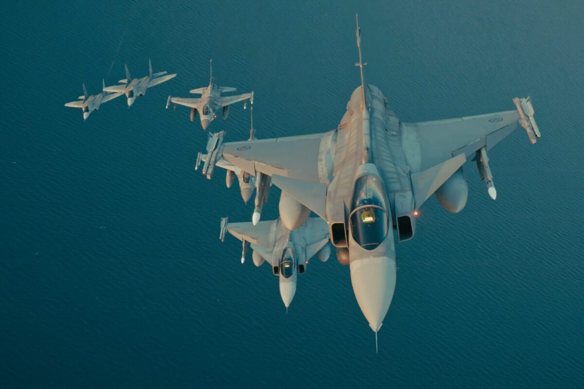 Polish and Swedish fighter jets flying in formation