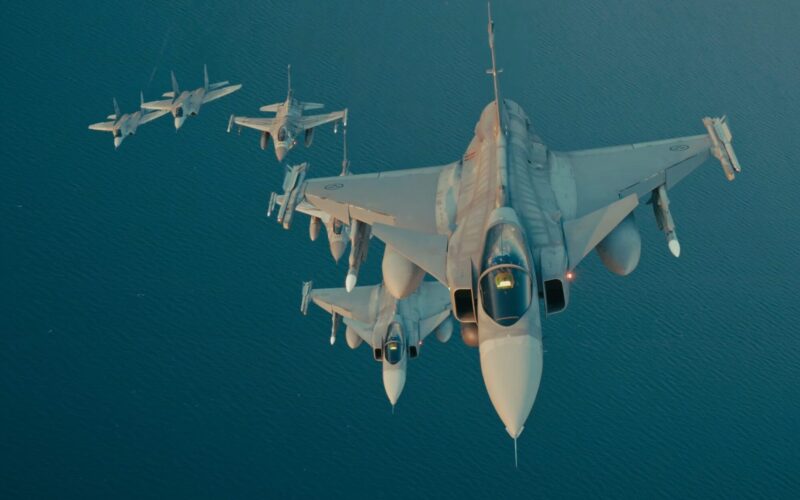 Polish and Swedish fighter jets flying in formation