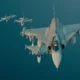 Polish and Swedish fighter jets flying in formation