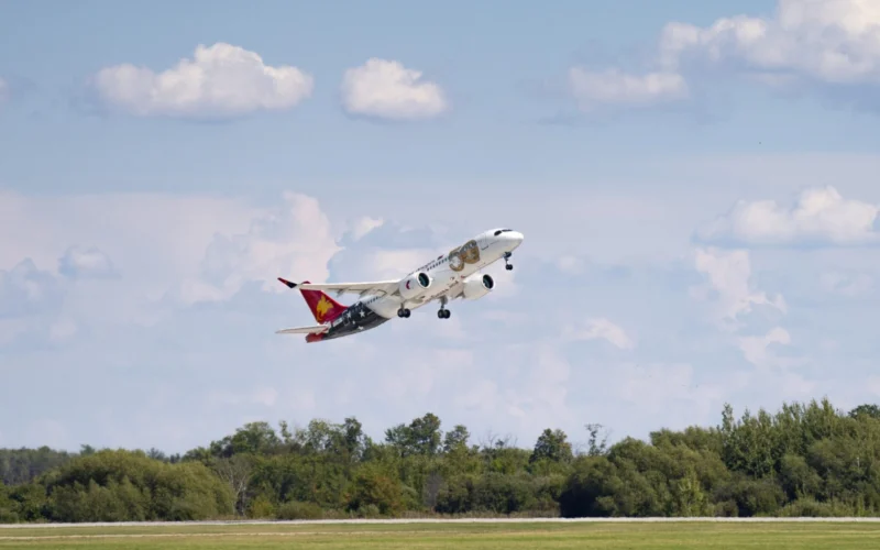 Air Niuginis Airbus A220 300 aircraft named The Peoples Balus The Peoples Bird