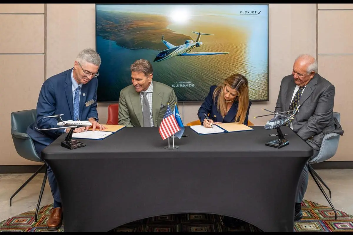 president-butler-kenn-and-pamela-ricci-chairman-hosseini-signing-3x2