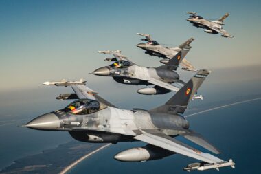 Romanian and Polish F 16 fighters flying in formation