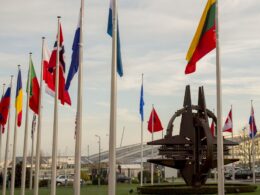 NATO country flags wave at the entrance of NATO headquarters in Brussels