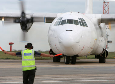 L 100 Hercules freighter aircraft on the runway
