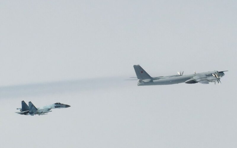 Russian Tu 95 and Su 35 military aircraft over the Bering Sea Russian Tu 95 and Su 35 military aircraft over the Bering Sea