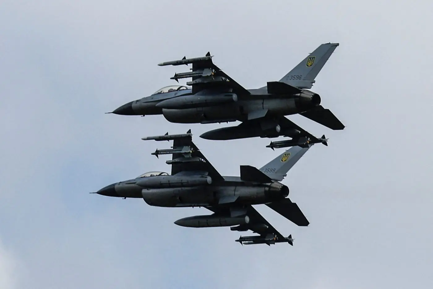 Ukrainian Air Force F 16 fighters fly over an undisclosed location