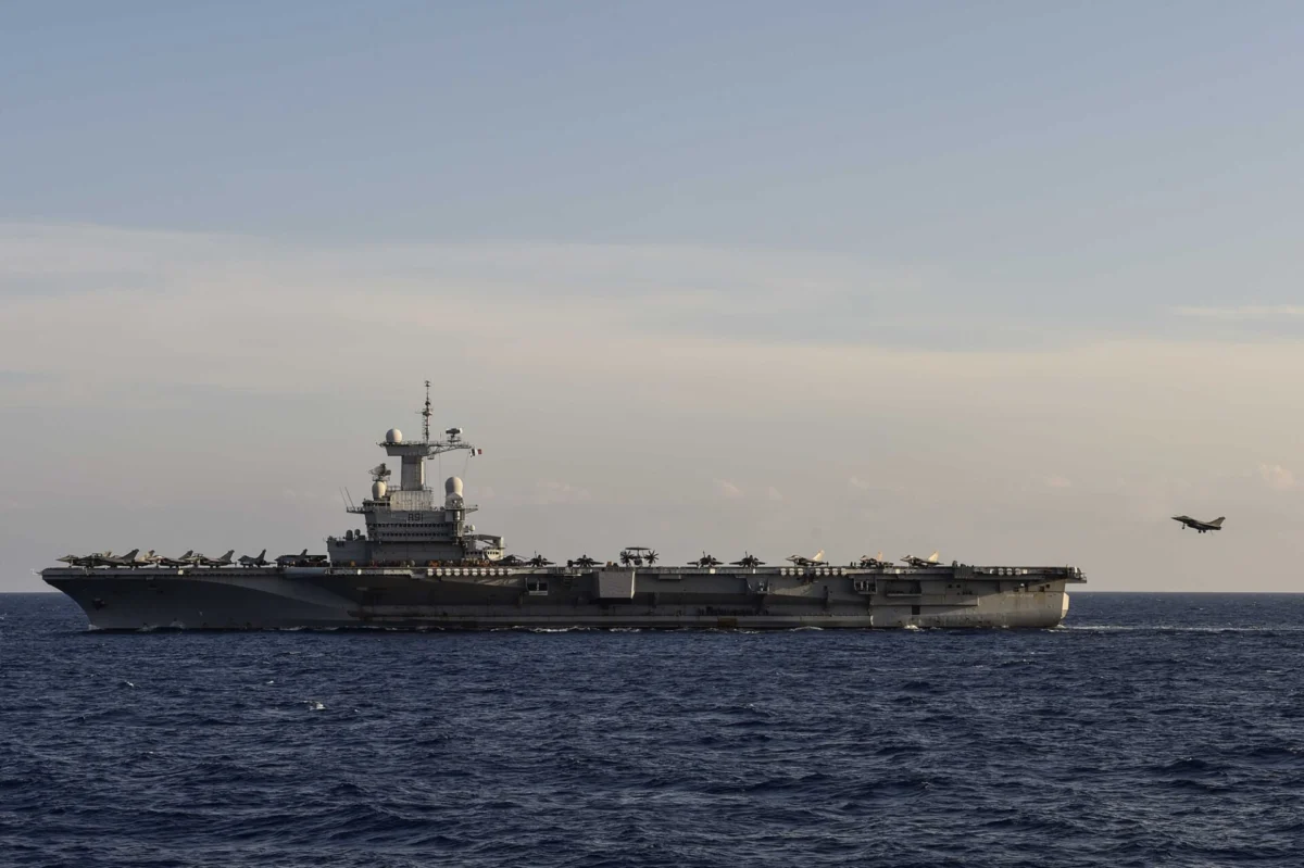 A French Navy Rafale Marine landing aboard the Charles de Gaulle aircraft carrier
