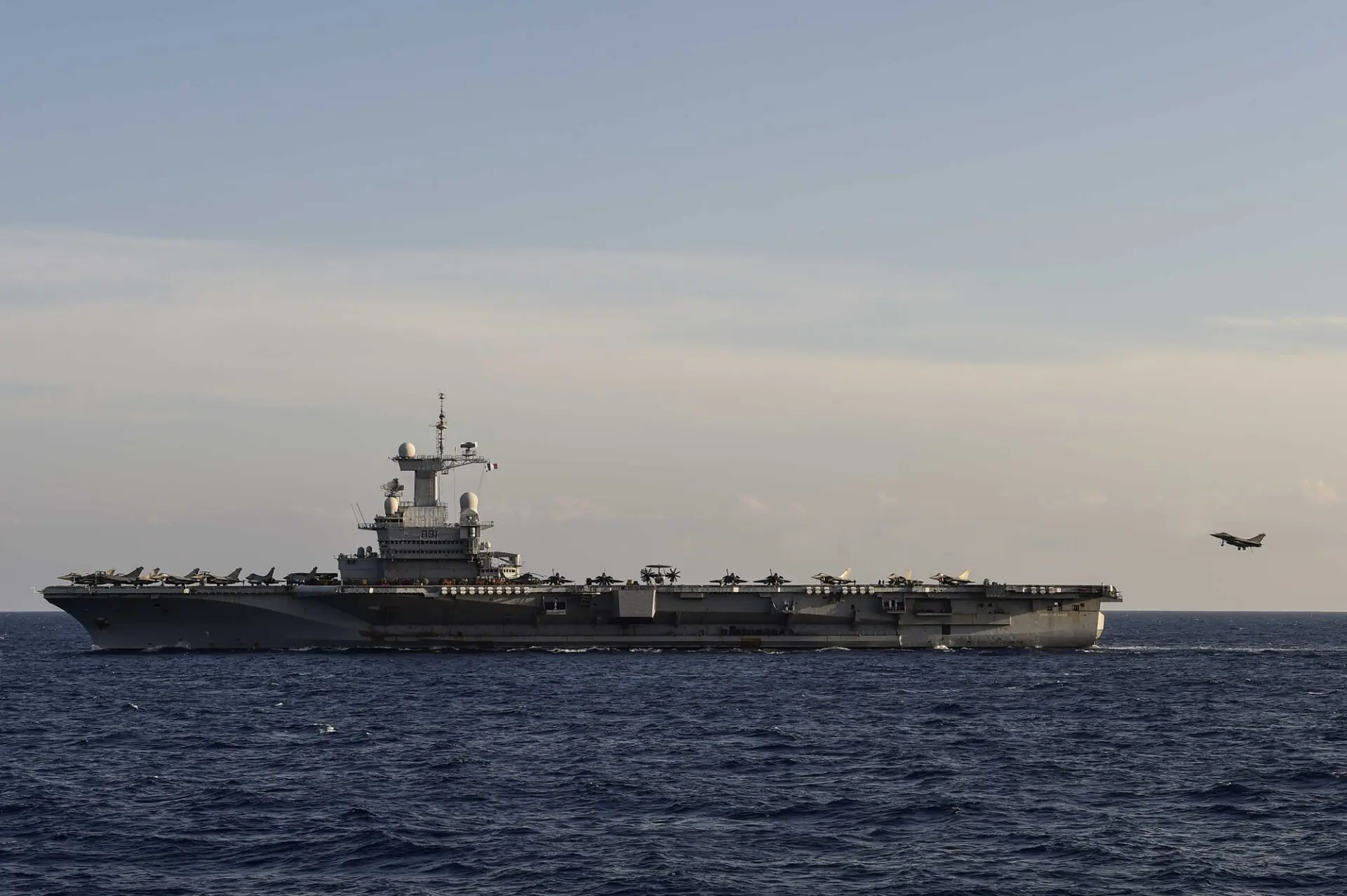 A French Navy Rafale Marine landing aboard the Charles de Gaulle aircraft carrier