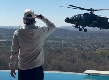 Kid Rock salutes hovering US Army Apache helicopter