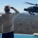 Kid Rock salutes hovering US Army Apache helicopter