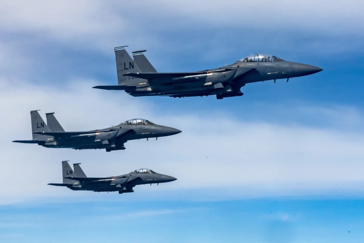 Three US Air Force F 15E Strike Eagle aircraft Three US Air Force F 15E Strike Eagle aircraft