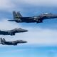 Three US Air Force F 15E Strike Eagle aircraft