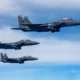 Three US Air Force F 15E Strike Eagle aircraft
