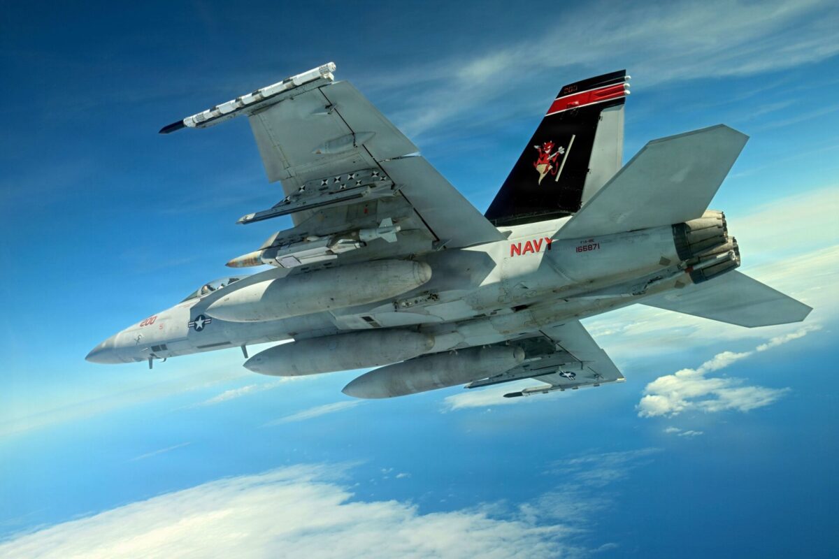 A US Navy FA 18 carries the new Joint Direct Attack Munition JDAM Long Range LR variant