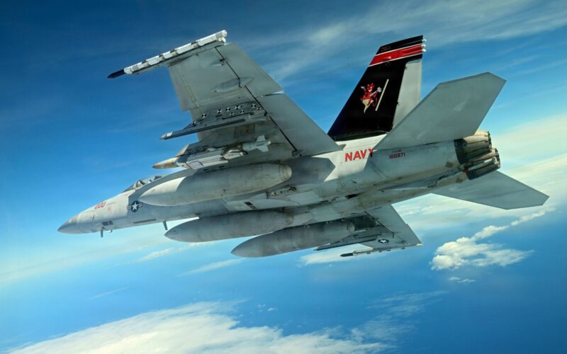 A US Navy FA 18 carries the new Joint Direct Attack Munition JDAM Long Range LR variant