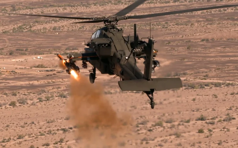 An AH 64 Apache helicopter launches an Altius 700 Medium Range Launched Effect MR LE