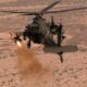 An AH 64 Apache helicopter launches an Altius 700 Medium Range Launched Effect MR LE