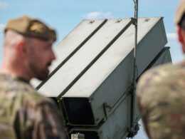NATO and Latvia Air Force personnel near NASAMS air defense system