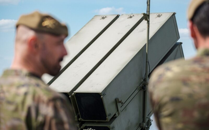 NATO and Latvia Air Force personnel near NASAMS air defense system
