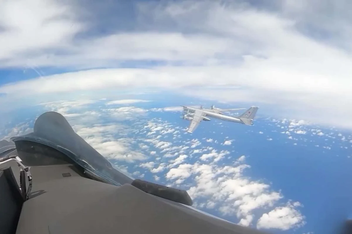 A Russian Tu 95MS strategic bomber seen from an escort aircraft during a long range patrol over international waters