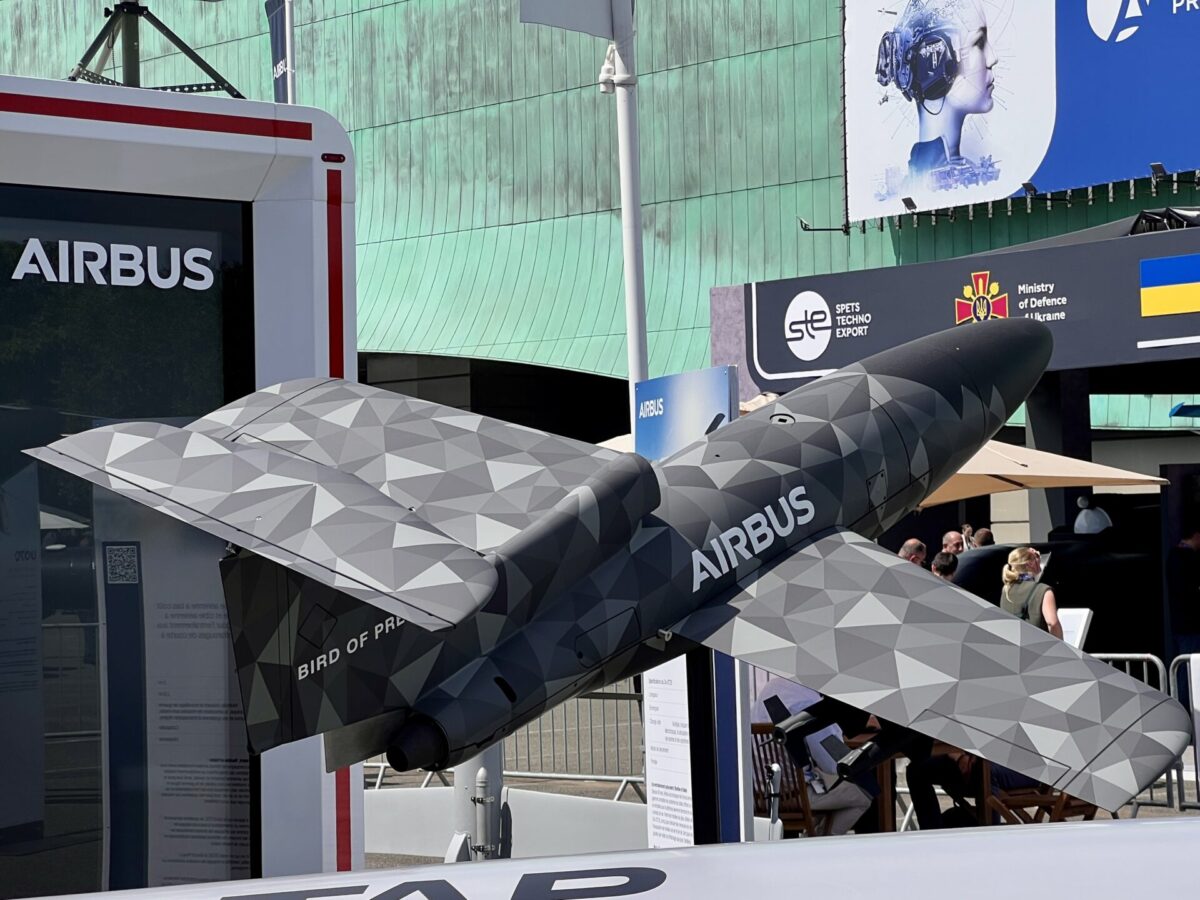 Airbus Bird of Prey at Eurosatory 2026 Polygon patterned Airbus aircraft model on display at an expo with a large Airbus sign in the background