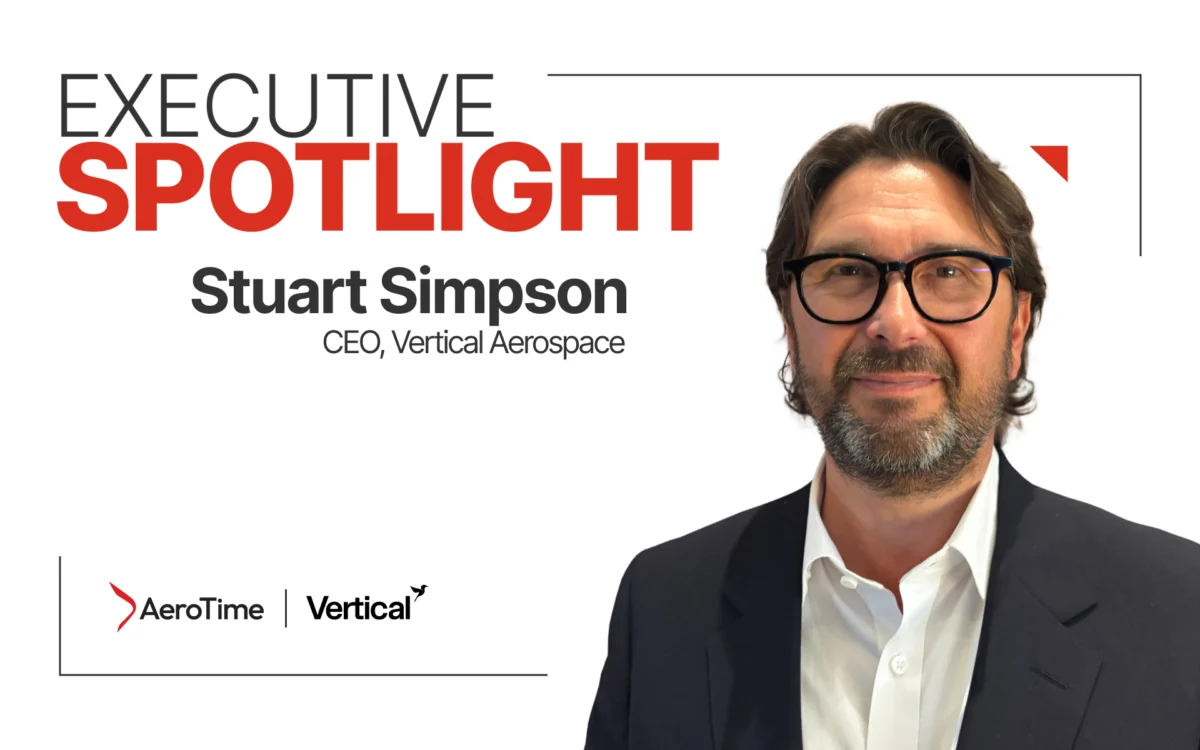 Portrait of Stuart Simpson CEO of Vertical Aerospace on a white banner with the words Executive Spotlight and company logos in the corner right side