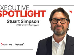 Portrait of Stuart Simpson CEO of Vertical Aerospace on a white banner with the words Executive Spotlight and company logos in the corner right side